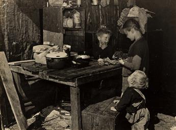 MARION POST WOLCOTT (1910-1990) Three photographs depicting the children of migrant packing house workers who are living in a lean to